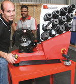 Fluiconnecto’s central warehouse in Gauteng offers a full range of products. Seen here at the hose crimping 
machine is Vaughn Grib with Collen Letsoko